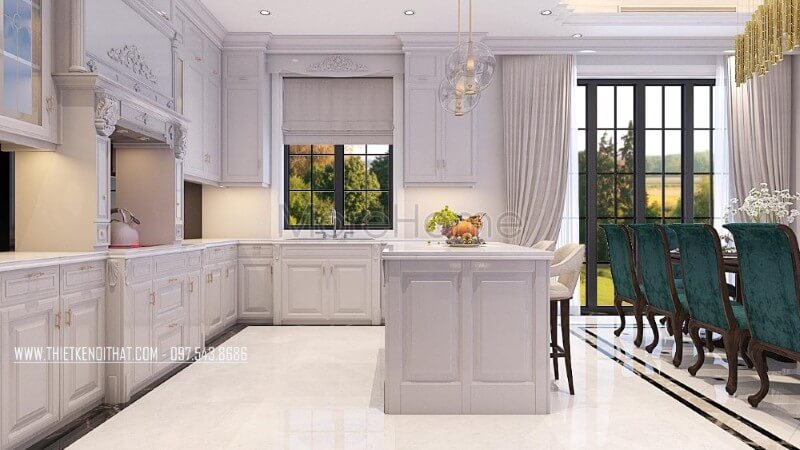 Không gian phòng bếp biệt thự được sử dụng khá nhiều các cột tròn với chi tiết trạm khắc nhẹ nhàng là một trong những đặc điểm điển hình của phong cách thiết kế nội thất tân cổ điển Nội thất phòng bếp tân cổ điển