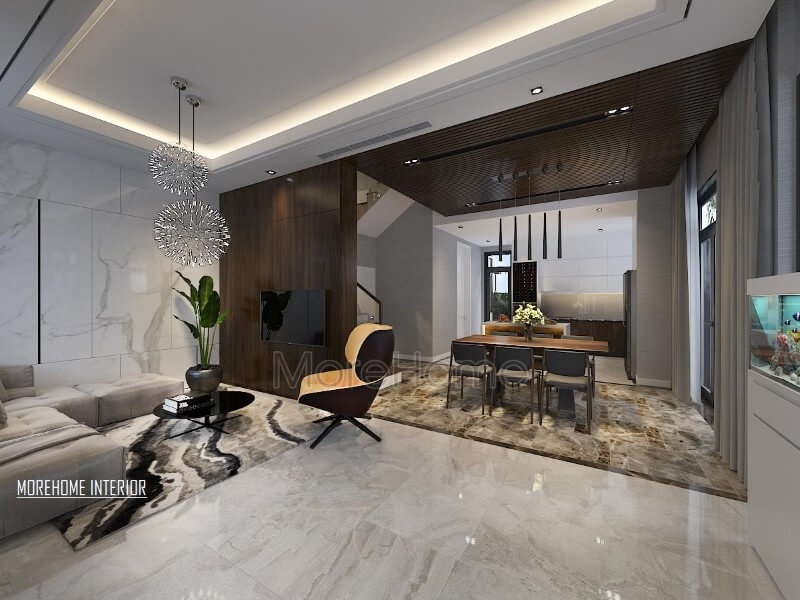 Điểm nhấn ấn tượng giữa gỗ ốp tường cùng đá lát sàn cao cấp tạo nên ánh nhìn hiện đại, độc đáo cho phòng khách liền bếp ăn. Thiết kế nội thất